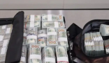 男子攜帶230萬(wàn)成捆美元現(xiàn)金入境被查 究竟是怎么回事？